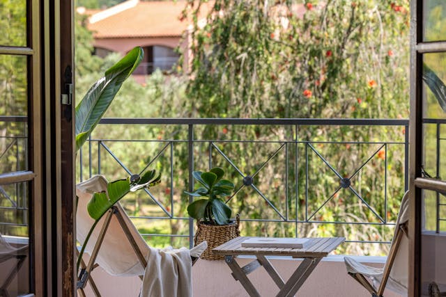 Family appartement met privé balkon of veranda en tuinzicht