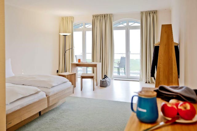 Upleven-Zimmer mit Balkon & Meerblick